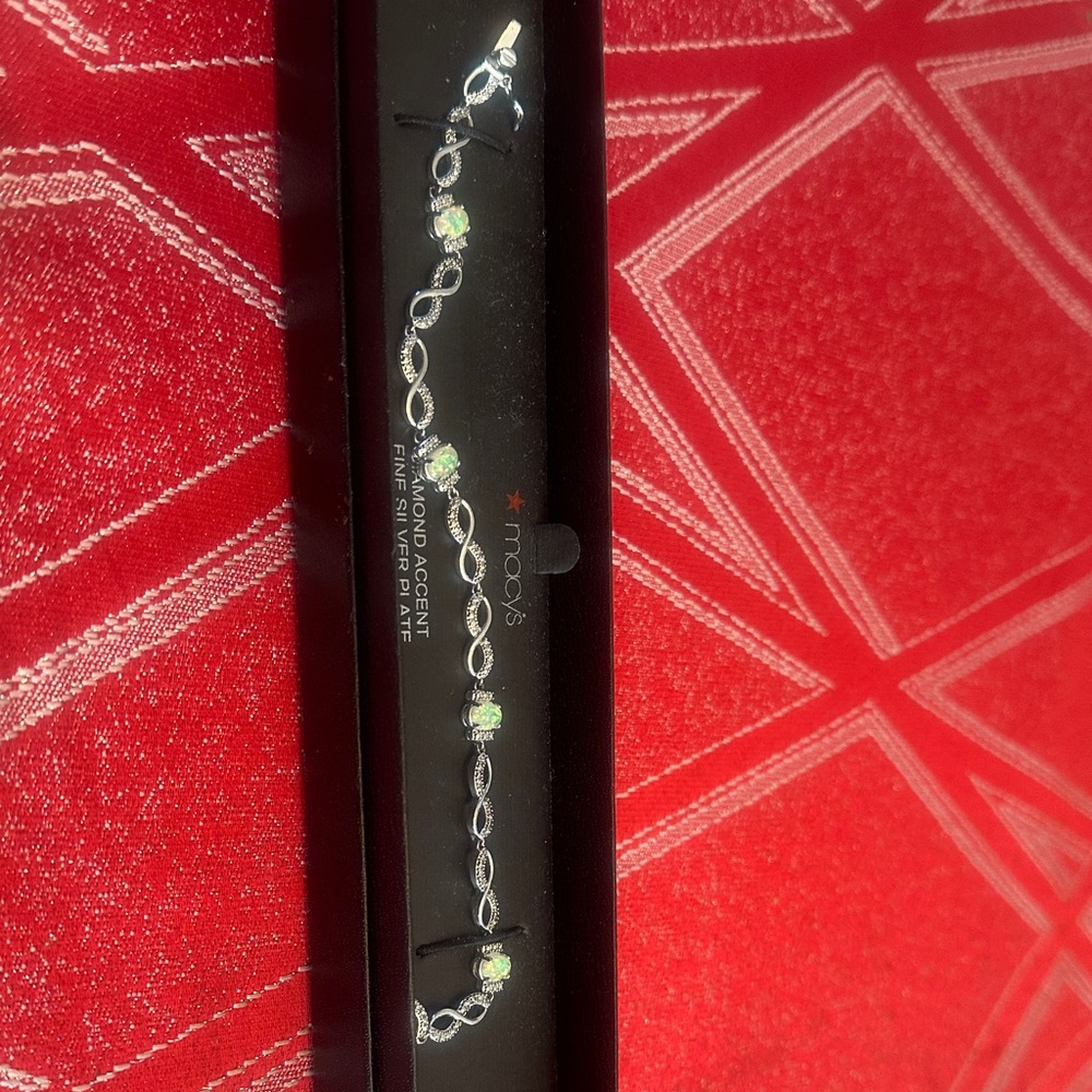 Macy's Silver Bracelet with Green Highlights